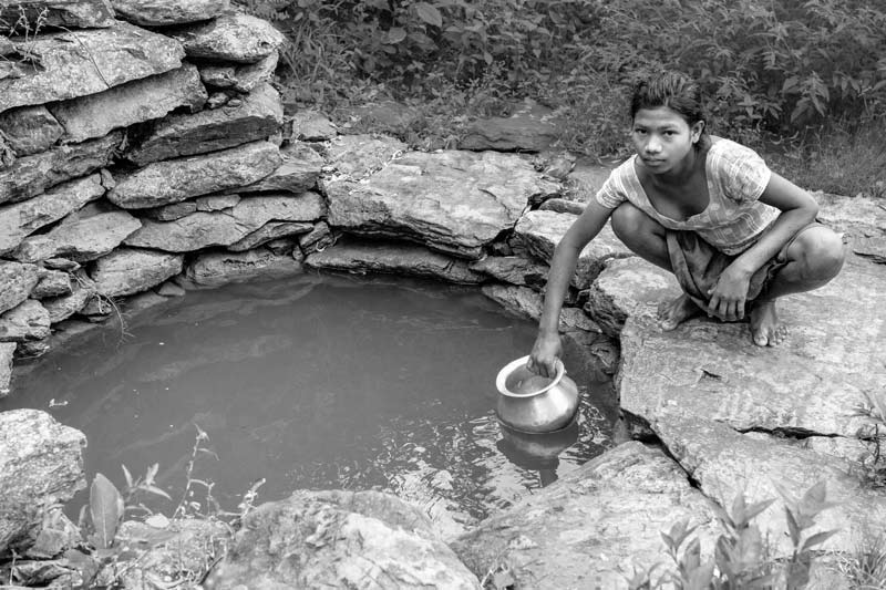 Impediments to enjoyment of Human Right to Water: 'Accessibility' Norm - Procuring water from a distant source located in the paddy fields in a tribal village in West Singhbhum district, Jharkhand